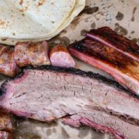 2 Meat Bbq Plate · Choice of two 1/4 pound portions of meat, and choice of two sides. Includes bread, pickles, ...