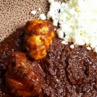 Doro Wot (Chicken)  · Onion, garlic, red chili pepper, Ethiopian purified butter comes with Injera and cottage che...