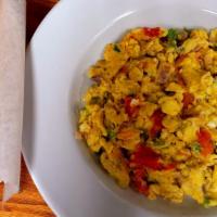 Egg Scrambled  · Onion,  jalapeño pepper, tomato, and seasonings with bread.