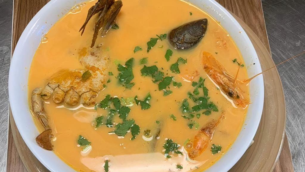 Sopa De Mariscos · Soup made with crab, mackerel fish, shrimp, seafood mix and heavy cream. Served with 2 tortillas.