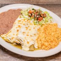 Enchiladas Suizas (3) · Three enchiladas with your choice of meat or cheese. Covered with green tomatillo sauce. Top...