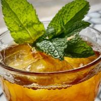 Moroccan Mint Iced Tea · Our house made Moroccan Mint iced tea! Sweetened