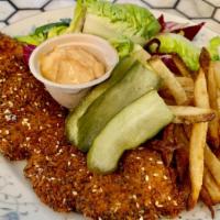 Schnitzel Plate · sesame crusted free range chicken, served with french fries and romaine chopped salad with t...