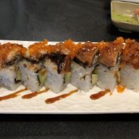 Dragon Roll · california roll with eel, eel sauce on top.