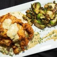Lemon Chicken Tenders · marinated & served with banana pepper cream - fried golden - risotto - Brussels sprouts.