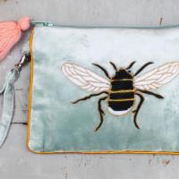 Velvet Bee Wrist Bag · Eden velvet bee pouch.

Materials: Cotton velvet .

Features: We love a bee! Luxurious sage ...