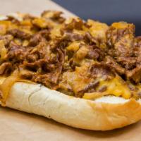 Ghost Whiz Cheesesteak · Ribeye, beer whiz, and onions. Served on a Amoroso roll.