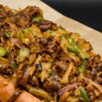 Ghost House Cheesesteak · Ribeye, onions, green peppers, and beer whiz. Served on a Amoroso roll.