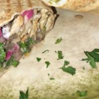Mixed Shawarma Combo · Served with fattoush, rice, hummus, garlic, bread.