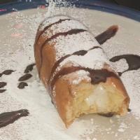 Fried Twinkie · This hostess deep fried twinkie is crunchy outside, soft and creamy on the inside.