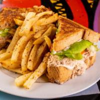 Tuna Of The Sea Sandwich · Served on toasted jalapeño Cheddarbrioche accompany with lettuce, tomato and mayonnaise and ...