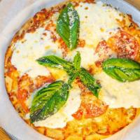 La Madrina (The Godmother) · Fresh house-made mozzarella, sliced tomatoes, fresh basil and mozzarella finished with a ble...