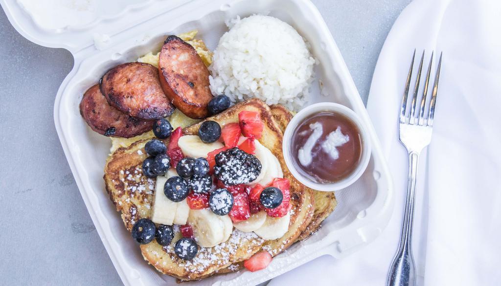 Jr Boy · 3 slices of French toast made on sweet Hawaiian bread.
seasonal fruit: 
2 eggs scrambled 
3 slices of Portuguese sausage  
1 scoop of rice
side of coconut maple  syrup
topped with powdered sugar
