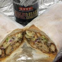 Breakfast Burrito With Turkey Sausage · Fresh chopped onions, green peppers, tomatoes, srambled eggs, turkey sausage, and cheese wra...