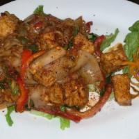 Veggie Drunken Noodles · Thai Spicy. Wide rice noodles stir fried with bell peppers, basil leaves, onions, and tomato...