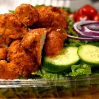 Crispy Chicken Salad · Our famous shop salad with crispy chicken and dressing of your choice