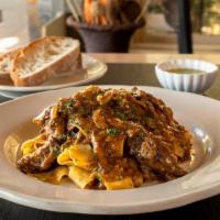 Pappardelle Brasato · pappardelle past in a braised beef, porcini mushroom, and red wine sauce
