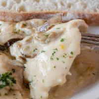 Pollo Porcini · Chicken breast lightly breaded sauté with white wine and porcini mushrooms sauce