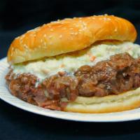 Cam’S Roast Beef · Thin flakes of roast beef on a grecian bun garnished with our cole slaw.