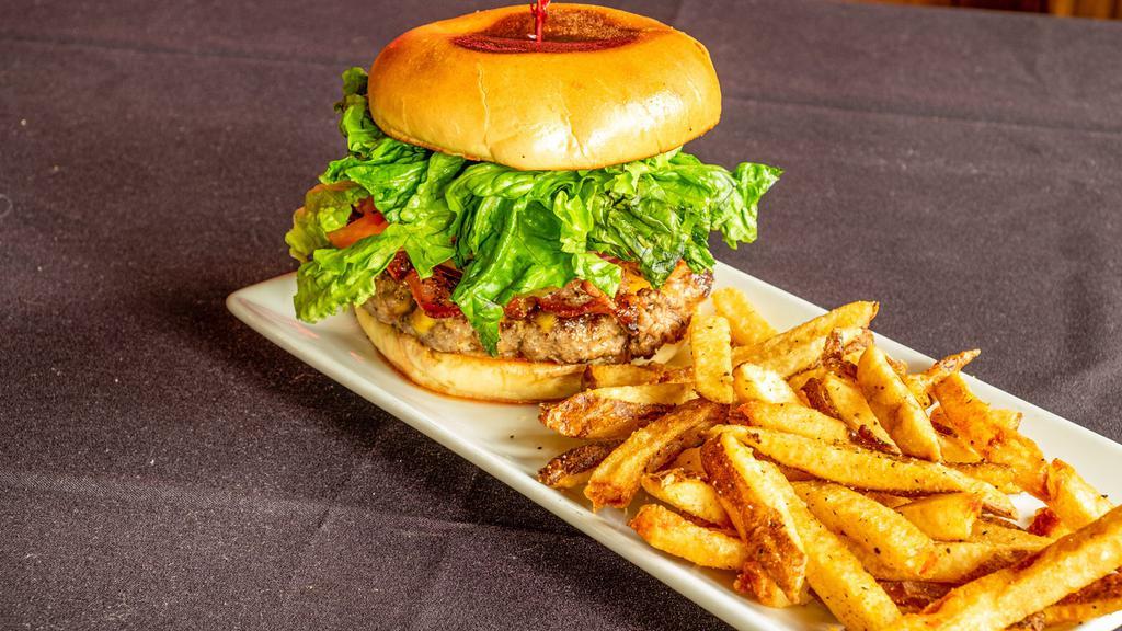Green Room Burger · 8 oz all-beef patty topped with lettuce, tomato, red onion, pickles, smoked cheddar and house-seasoned bacon served with your choice of side.