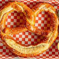 Bavarian Pretzel · Served with Creole mustard, honey butter and queso.