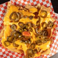 Nachos · With cheddar cheese and jalapeños.