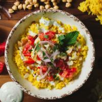 Saffron Rice Bowl · A scrumptious bowl of jasmine, turmeric saffron-infused rice, mint, tomatoes, toasted sliced...