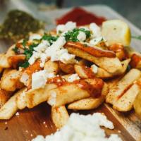 K-Fries · Crispy french fries w/ zatar spices, feta cheese,
spicy red sauce, crushed red pepper