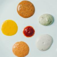 Add-On Sauces Or Spreads · Add side (2 oz.) of humus, feta, tzatziki, ka-baam, etc.