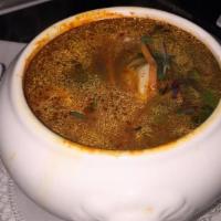 Korean Seafood Soup* · Aromatic herb soup, scallop, shrimp, calamari, mussel, Korean chili