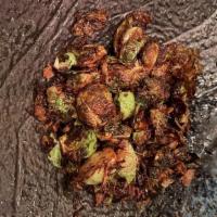 Brussels Sprouts · Crispy onion, garlic, butter