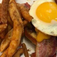 The Brunch Burger · Applewood smoked bacon, sweet maple bacon glaze, fried egg, aged Cheddar. Sub onion rings or...