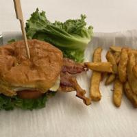 Fried Bologna Burger · Thick sliced fried bologna, tomato, green leaf, American. Sub onion rings or sweet potato fr...