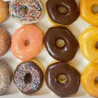 1 Dozen  Assorted Donuts  · 3 Glazed+ 3 Chocolate+ 3 Sprinkled or Icing Donuts + 3 Cakes