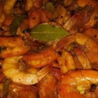 Sautée Shrimp · Served with potato and corn.