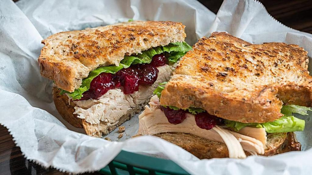 Turkey Cranberry. · Turkey breast, cranberry relish, mayo and lettuce on grilled multigrain.