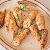 Chicken Botti Kabab · Cubes of chicken breast marinanted and baked in tandoor.
