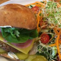 Veggie Burger · Field Roast Veggie Burger, Chao ‘cheese’, mixed greens, pickled red onions, Oregon Brinework...