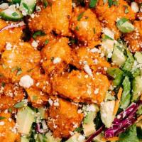 Buffalo Chicken Salad · Garden salad with crispy or grilled Buffalo chicken. Served with side of pita bread and choi...