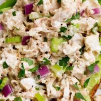Tuna Salad Salad · Garden salad topped with tuna salad. Served with side of pita bread and choice of 1 dressing.