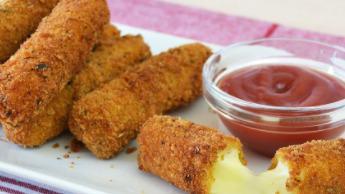 Fried Mozzarella Cheese · Mozzarella string cheese with seasoned breading and a side of dale's spicy marinara sauce.