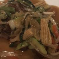 Ginger And Scallion Sauce Duck
 · Crispy duck with ginger, green and red peppers, scallion, and bean sauce.