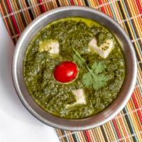 Palak Paneer · A perfect combination of fresh spinach and homemade cottage cheese, cooked with ginger and r...