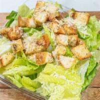 Caesar Salad · Romaine lettuce croutons, parmesan cheese.