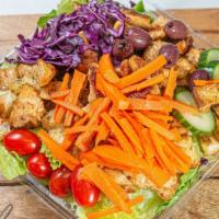 Grilled Chicken Garden Salad · Romaine lettuce, tomatoes, green peppers, red cabbage, cucumbers, carrots, olives and pepper...