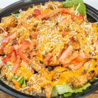 Chipotle Rice Bowl · Romaine lettuce topped with rice, cilantro, grilled chicken breast, black beans, tomatoes, c...