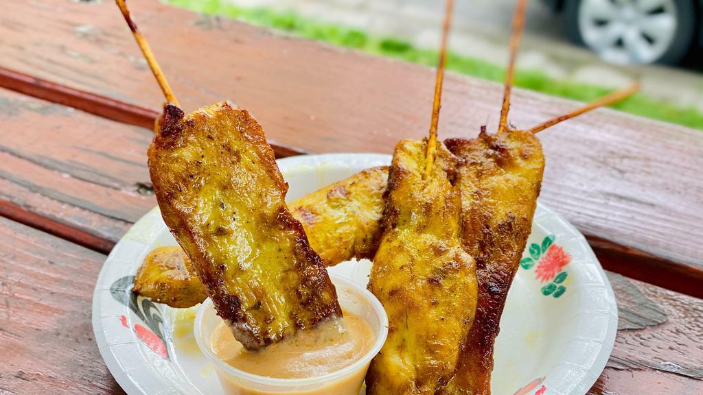 Chicken Satay (Four Pieces) · Grill the marinade chicken onto skewers high heat serve with peanut sauce.