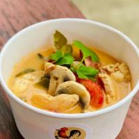 Tom Kha Kai · Coconut base soup with lemongrass, mushroom and tomatoes.