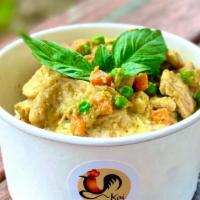 Green Kai Bulgogi · Stir fry green curry paste with coconut milk, peas, carrot and sweet basil. Choice of chicke...