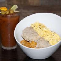 Sloppy Breakfast Bowl · Crispy tater tots, sausage gravy, 2 eggs, and biscuit
